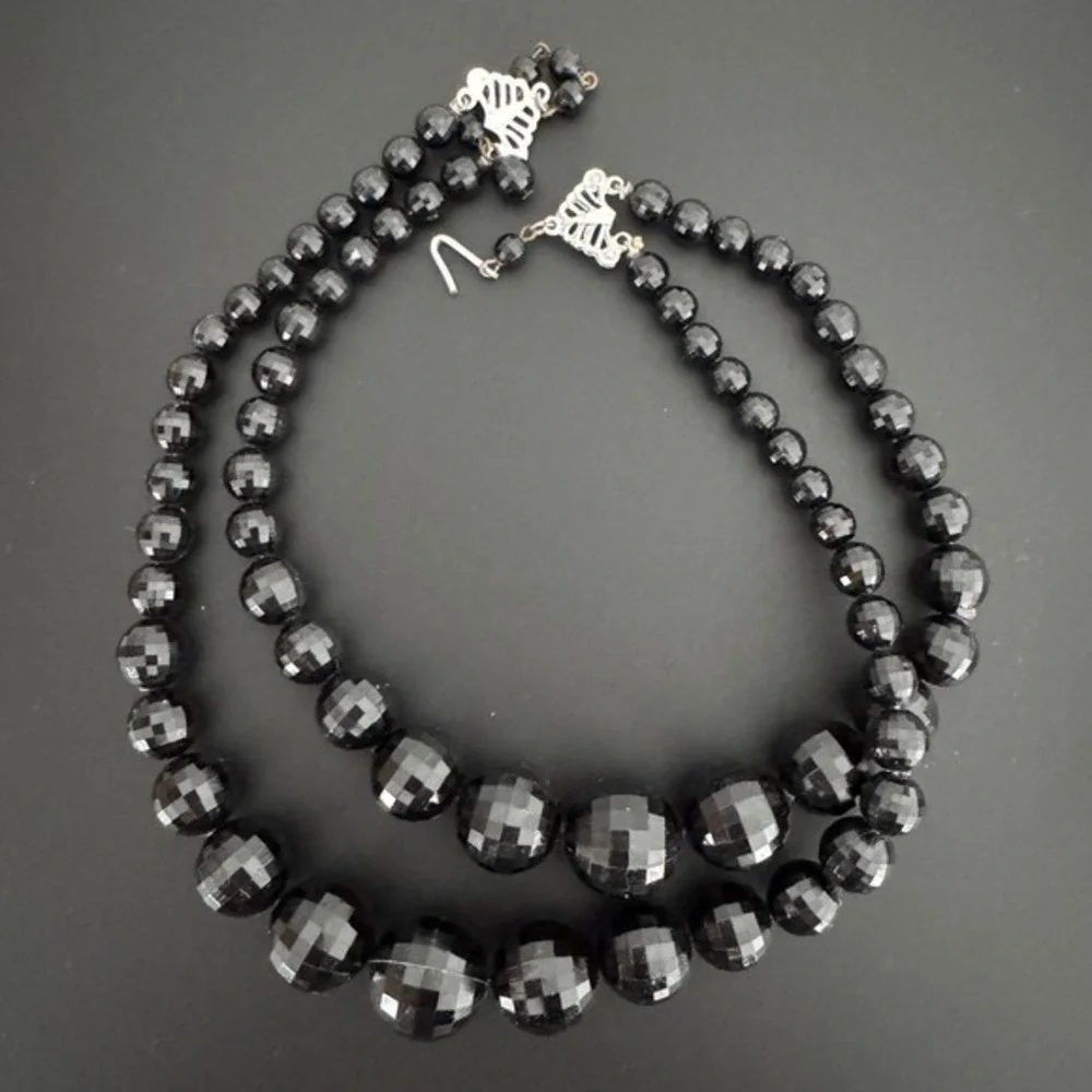 Vintage Black Faceted Bead Two Strand Necklace and Silver Tone Flower Brooch Set